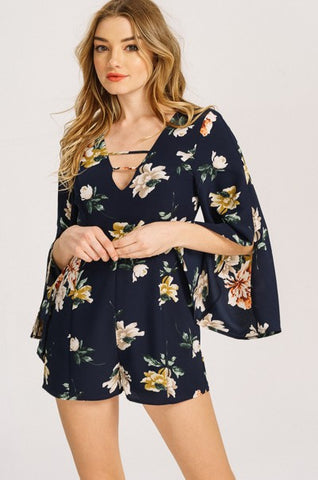 spring romper outfit with floral pattern